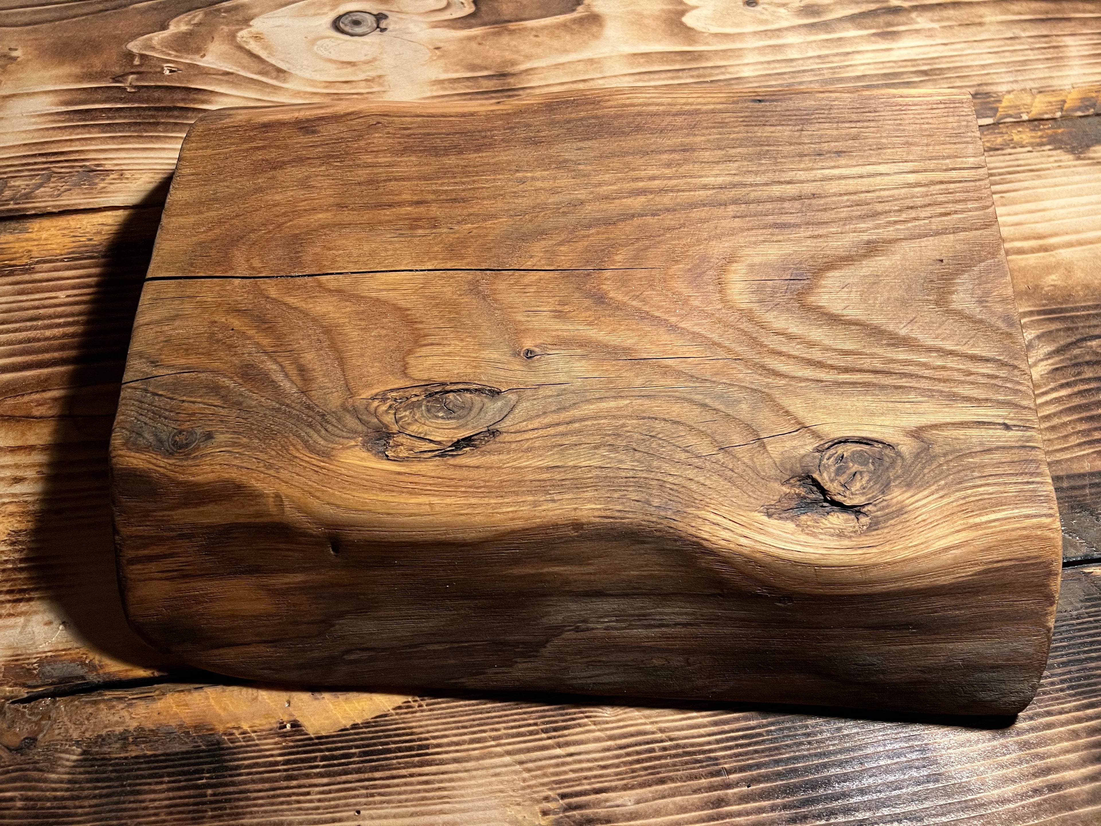 Close-up of a wooden surface with visible grain and texture